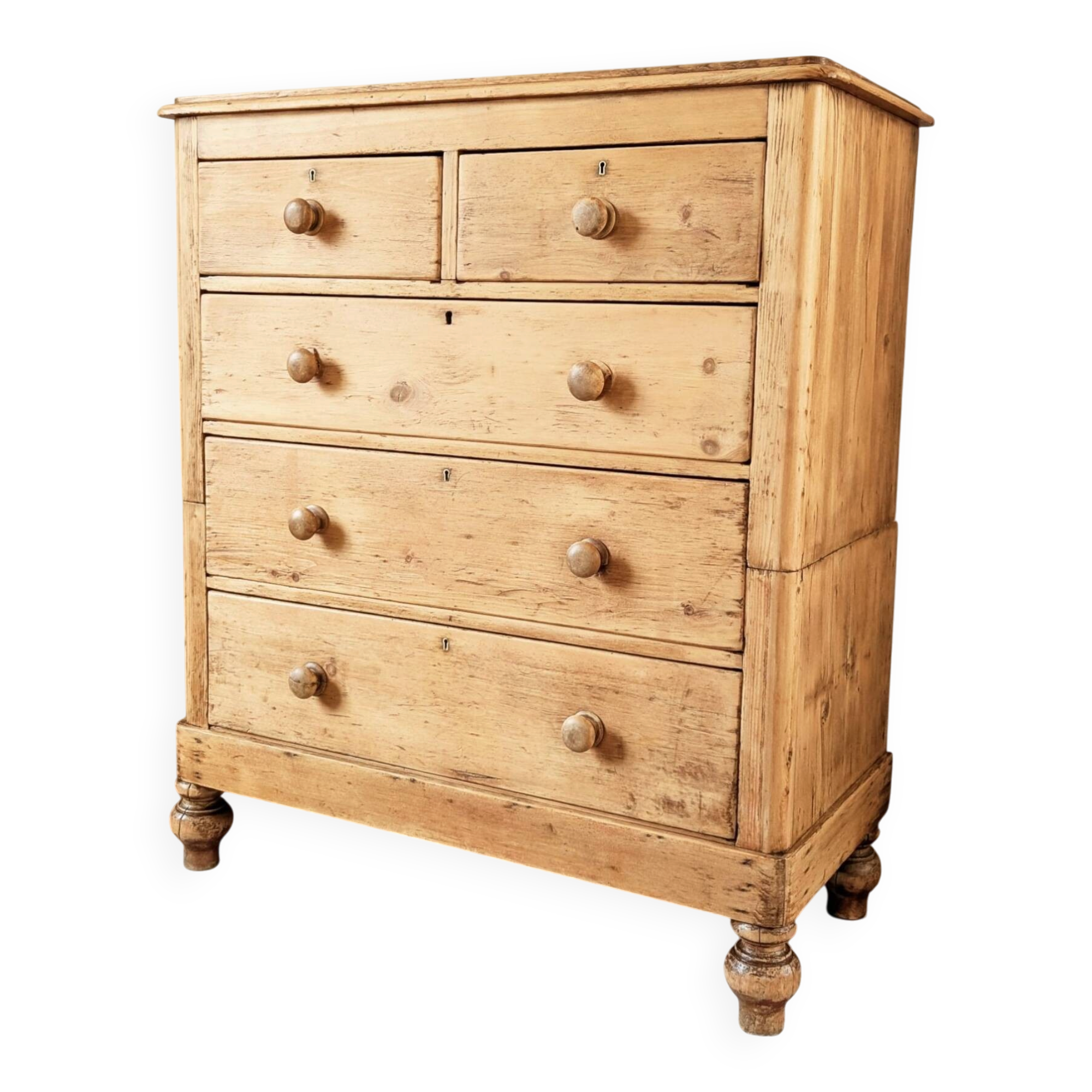 Large renovated antique English chest of drawers in solid pine.