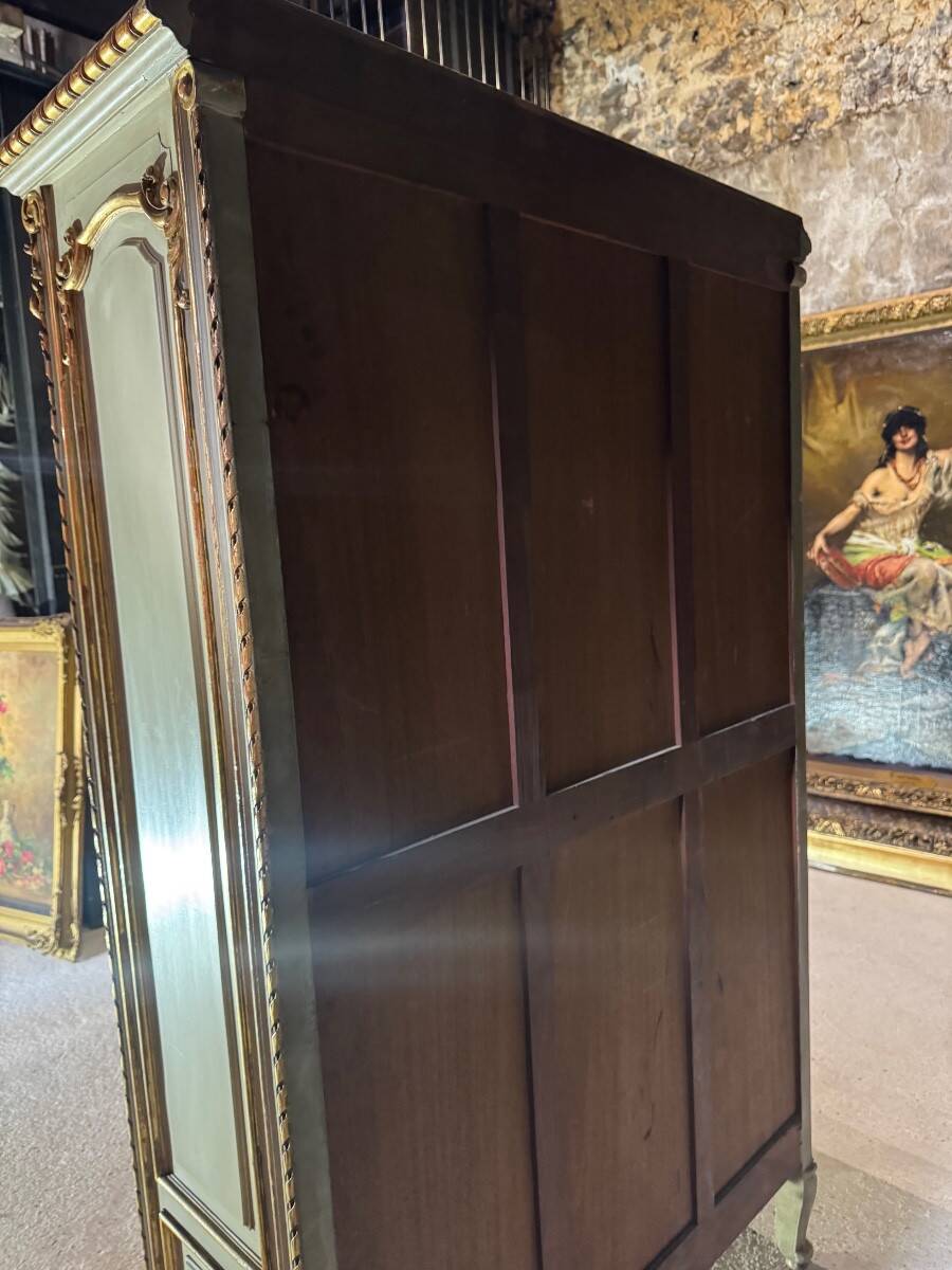 Bookcase in gilded wood and restored wood from the Napoleonic III period.