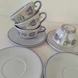Glazed earthenware cups and saucers