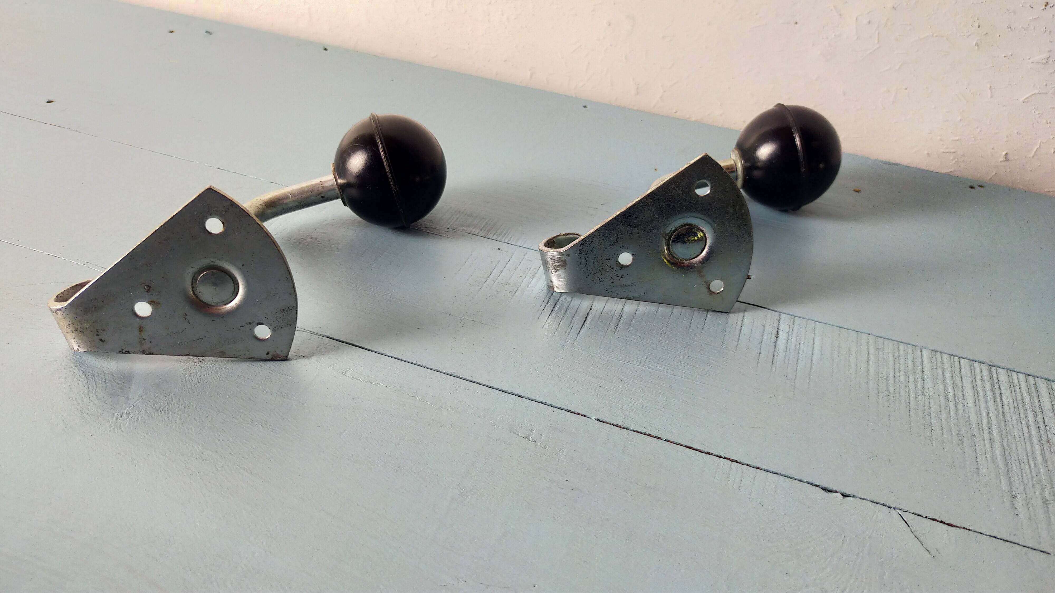 2 Bakelite ball coat hooks