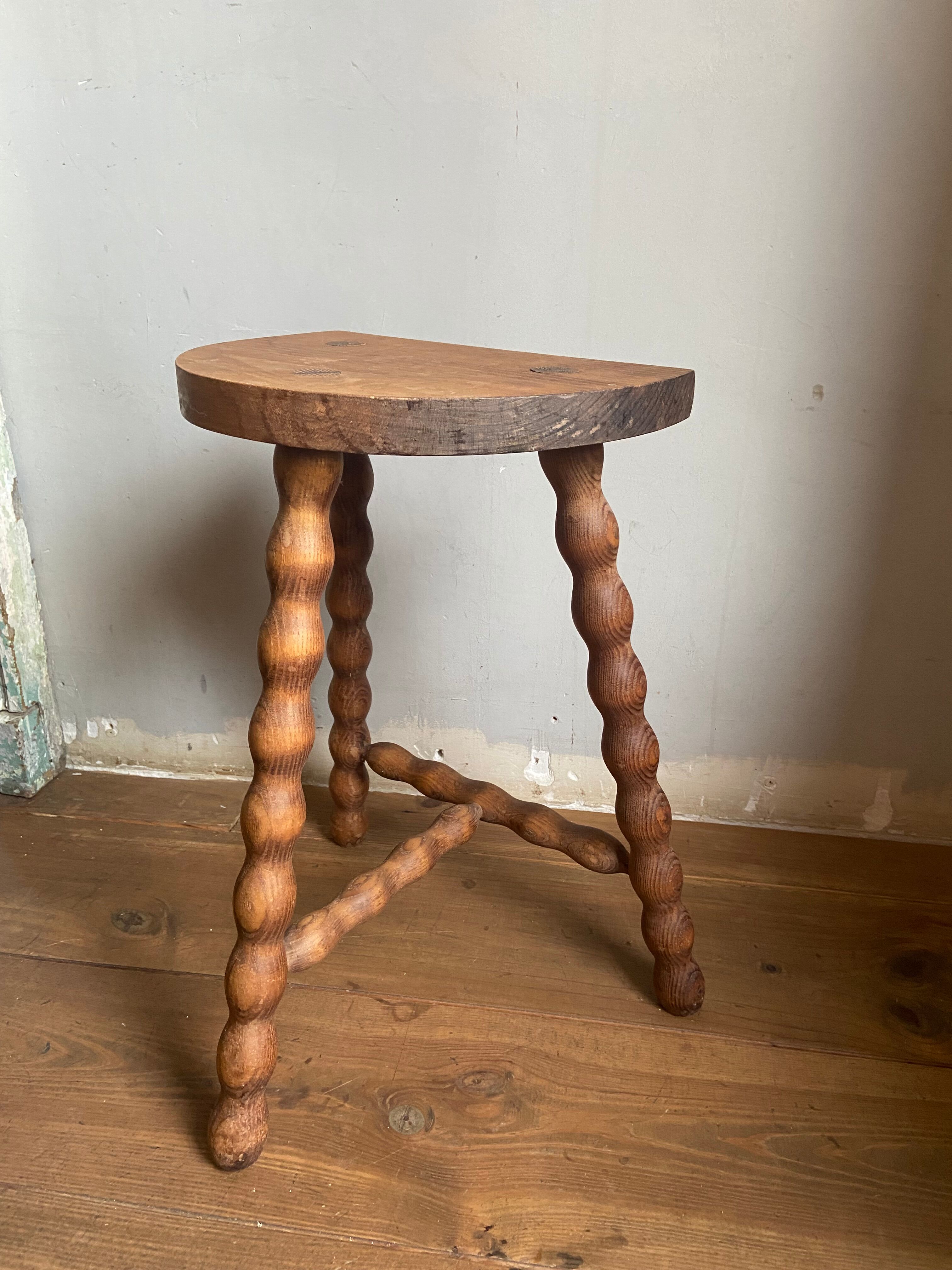 Pair of wooden milkman's stools turned brutalist
