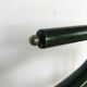 Vintage children's room valet in green varnished wood on roulette