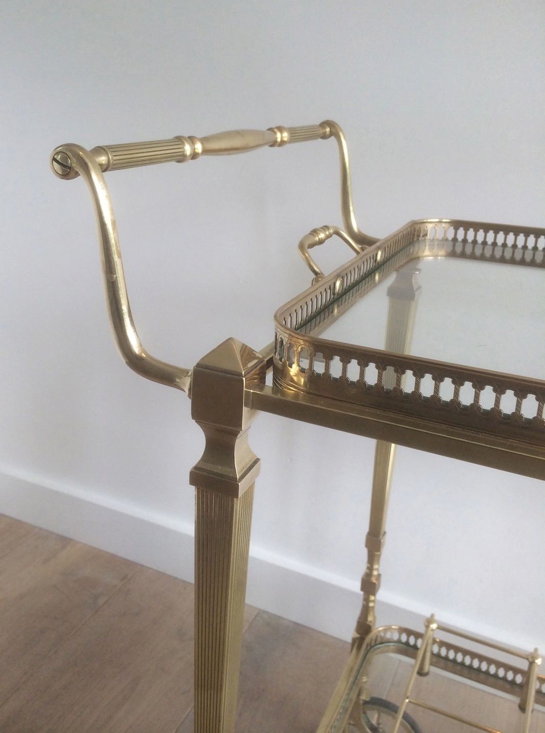 Brass rolling table from the Baguès house.