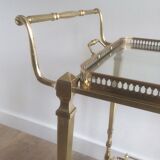 Brass rolling table from the Baguès house.