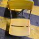 Yellow plastic and steel folding chairs, 1970s