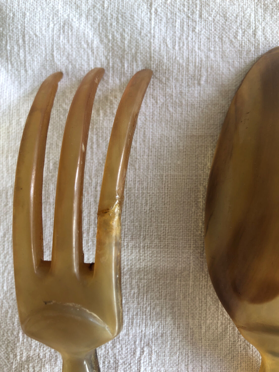 Old corn and silver salad cutlery