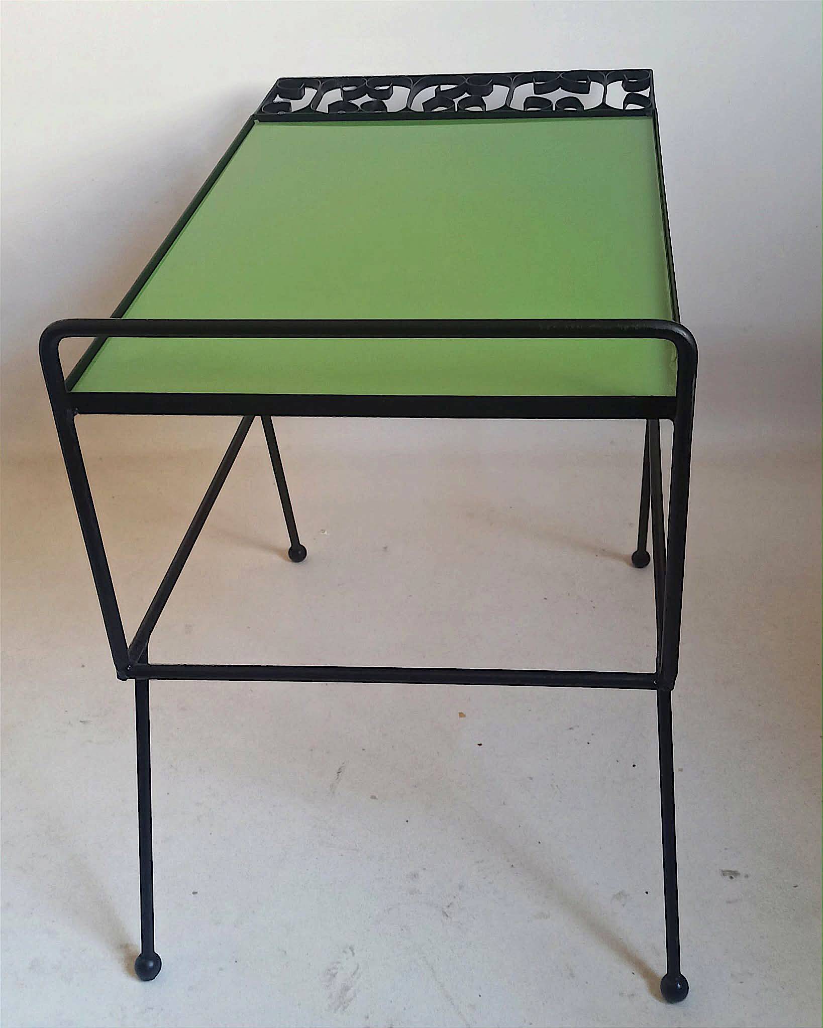 1960s side table with a lime green top, width 65.5 cm.