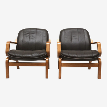 Set of 2 vintage Danish armchairs with leather upholstery from the 1970s