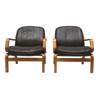 Set of 2 vintage Danish armchairs with leather upholstery from the 1970s