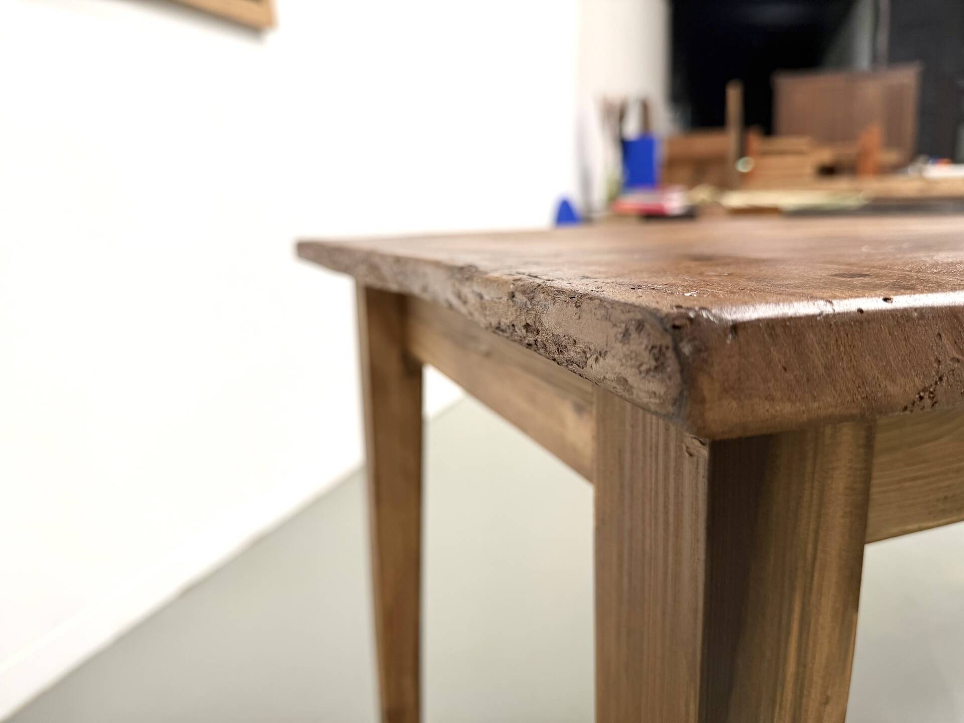 Farm table in walnut with spindle legs.