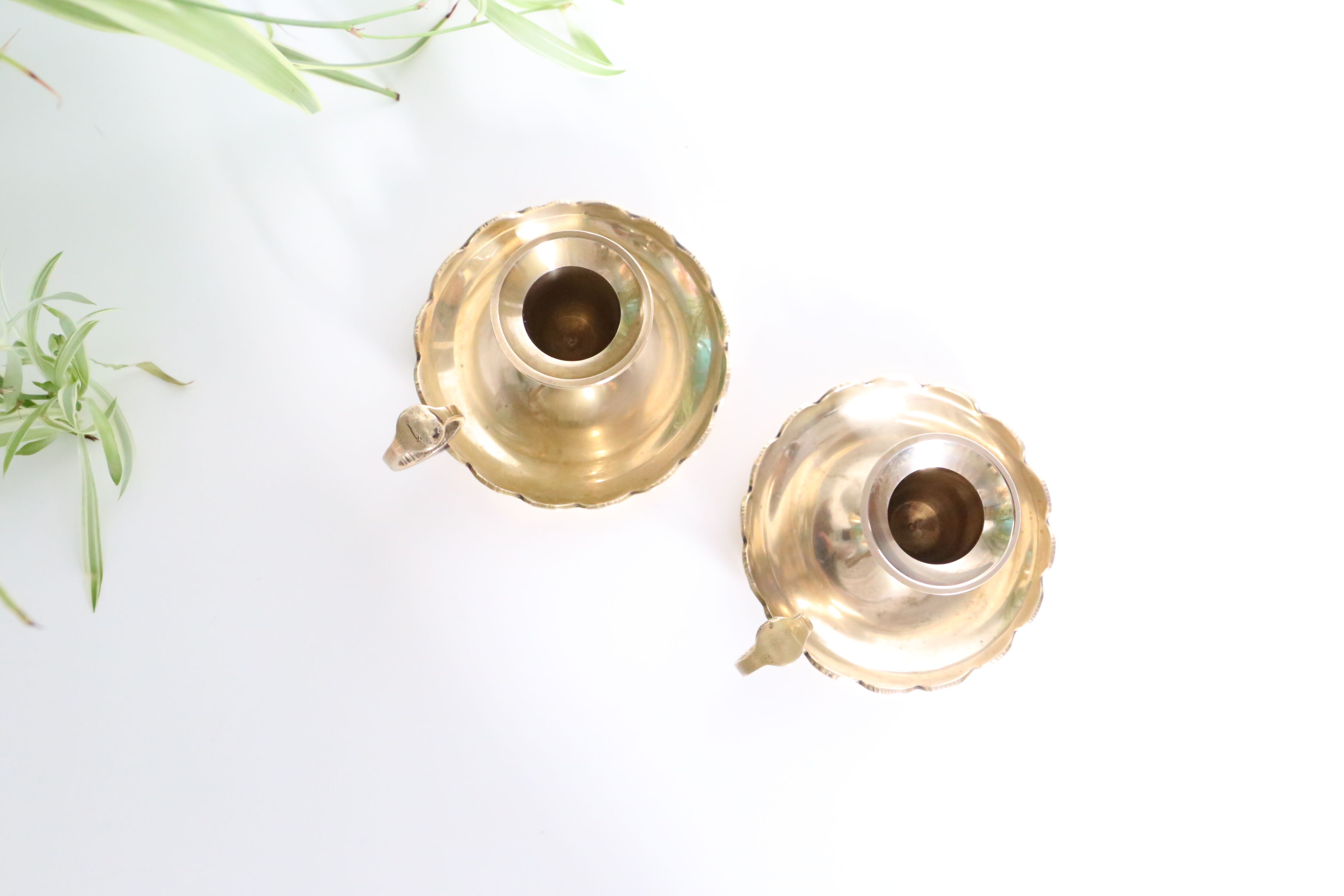 Duo of rat candlesticks in gilded brass