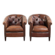 Characterful set of sheepskin club armchairs in English chesterfield style