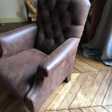 Armchair in brown leather
