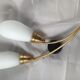 Pair of 60's gilded appliques 2 white conical lights