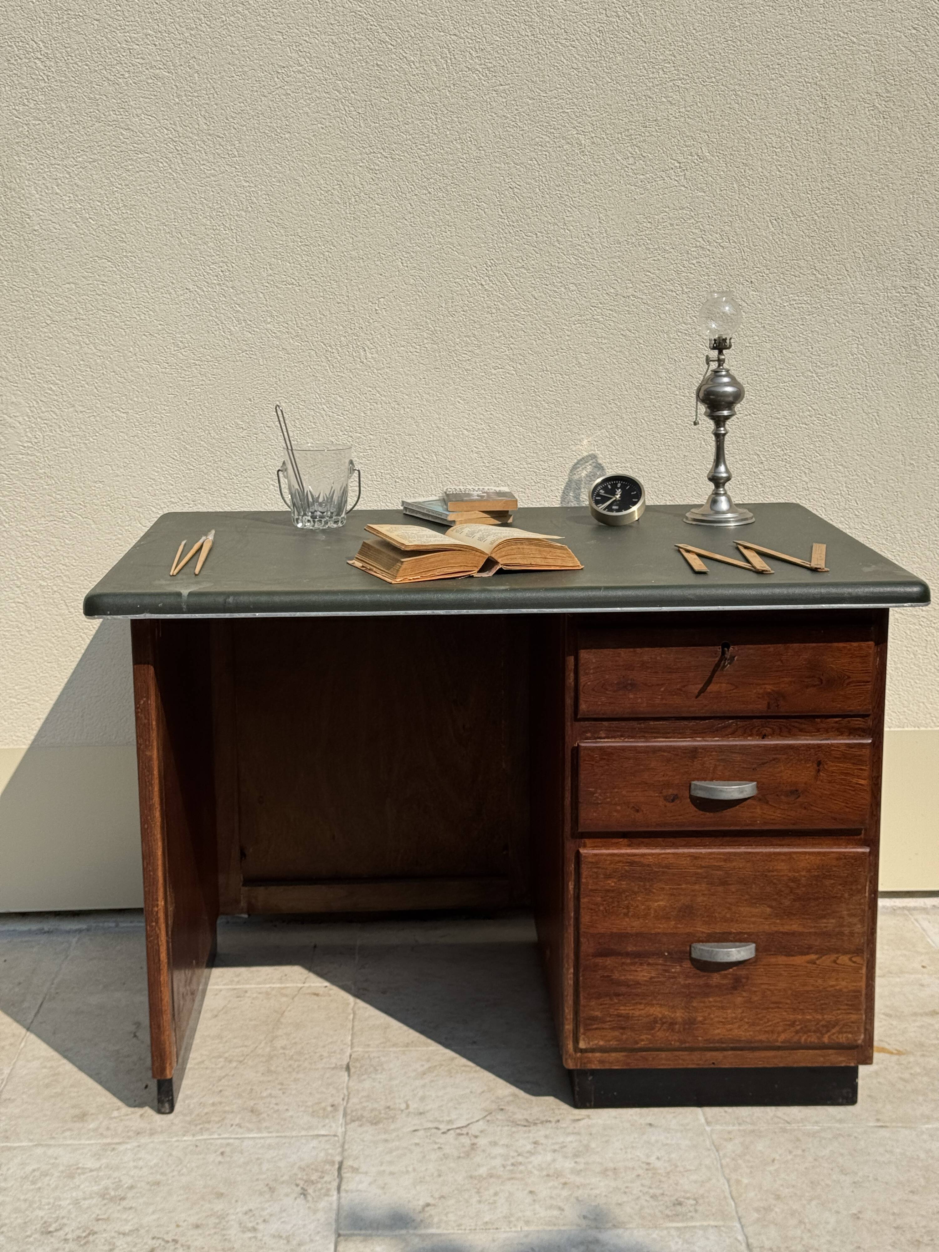 Modernist desk in wood and green moleskin upholstery