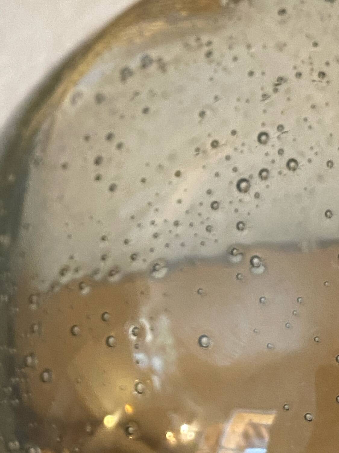 Blown and bubbled glass ball vase