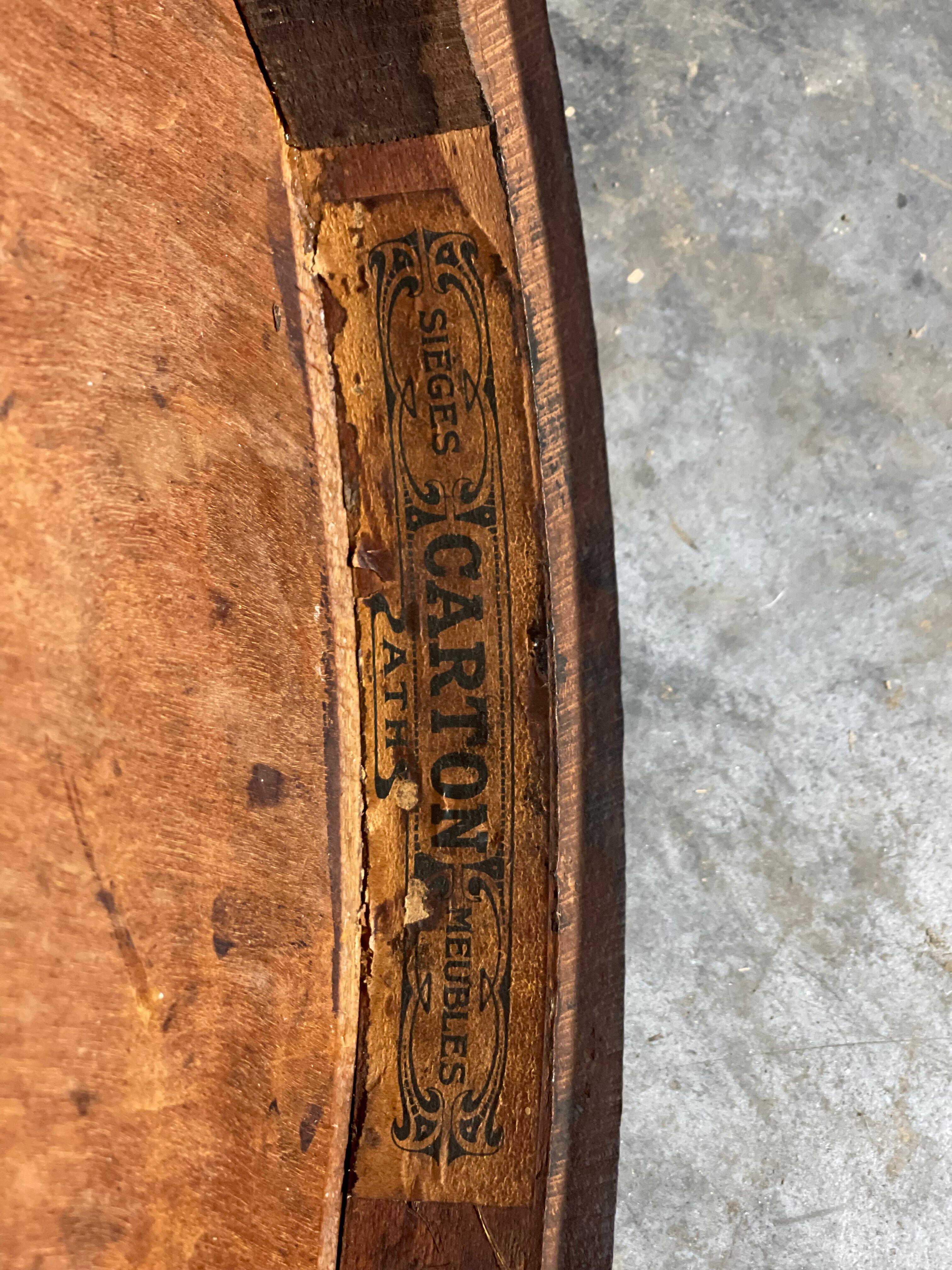 Curved wooden armchair