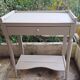 Repainted solid wood side table with lower shelf 1900
