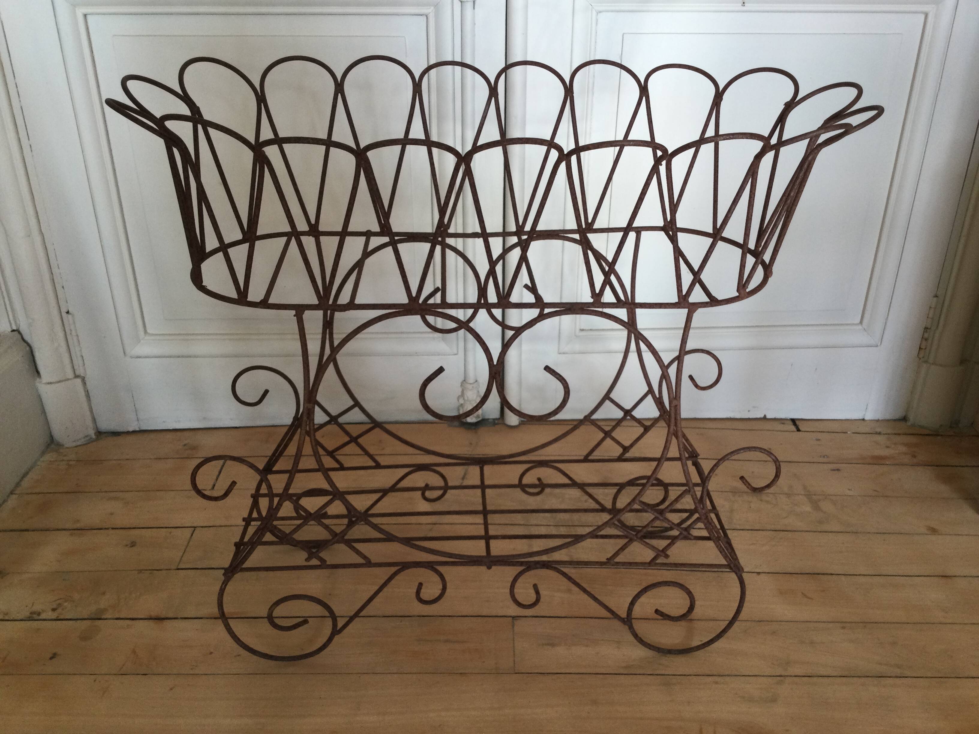 Antique iron plant stand