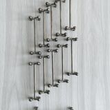 Ensemble de 11 porte-couteaux en métal.