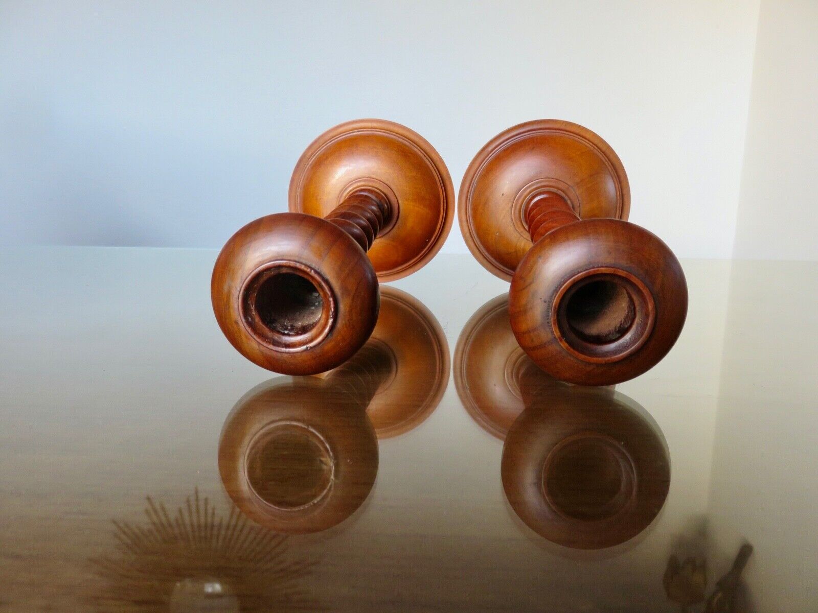 Pair of wooden candle holders turned art deco