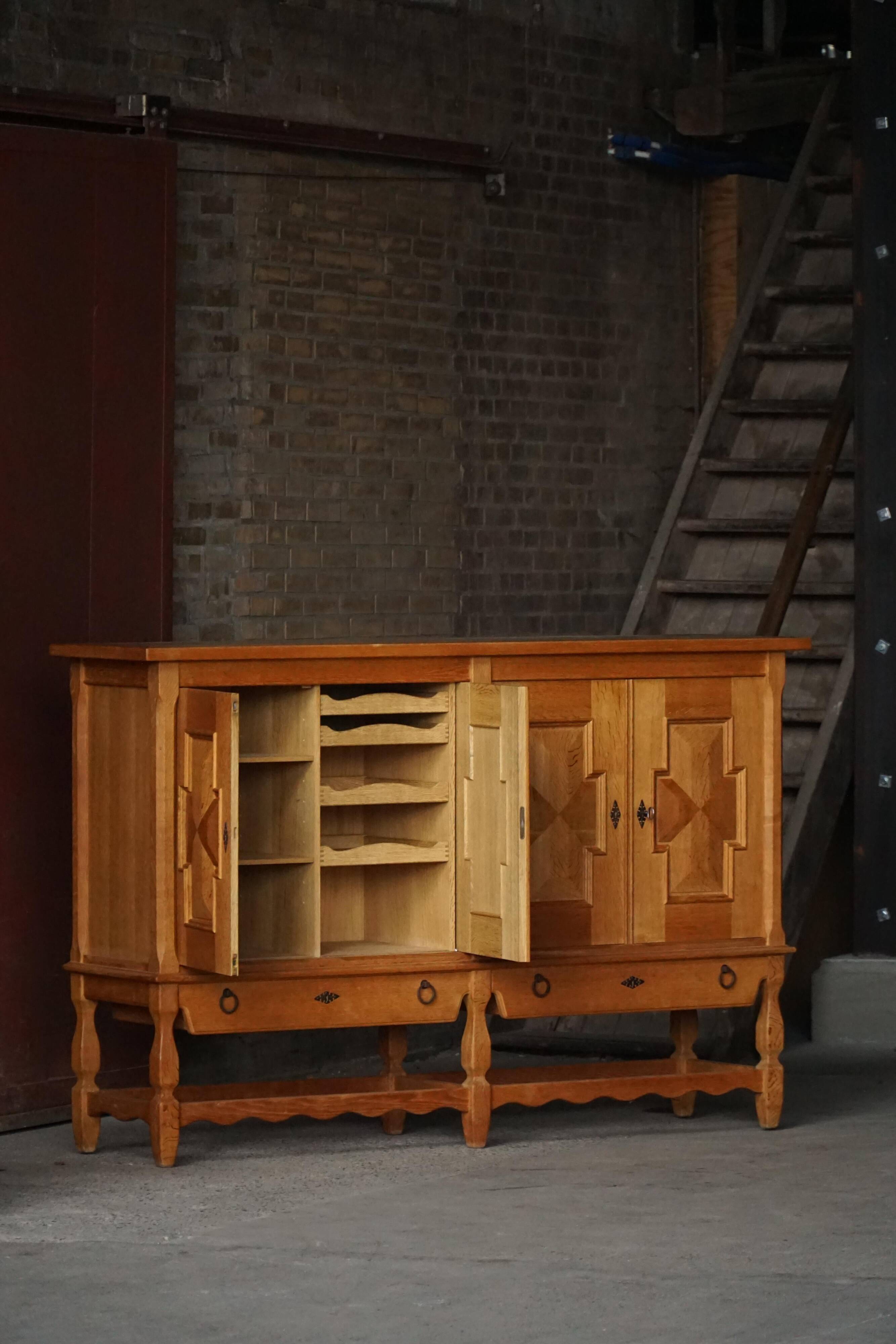 Henning Kjærnulf, enfilade in oak, mid-century Danish, Nyrup Møbelfabrik, 1960s.