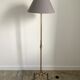 Vintage golden brass tripod floor lamp