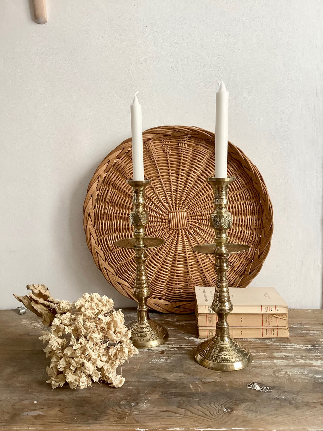Pair of engraved brass candle holders