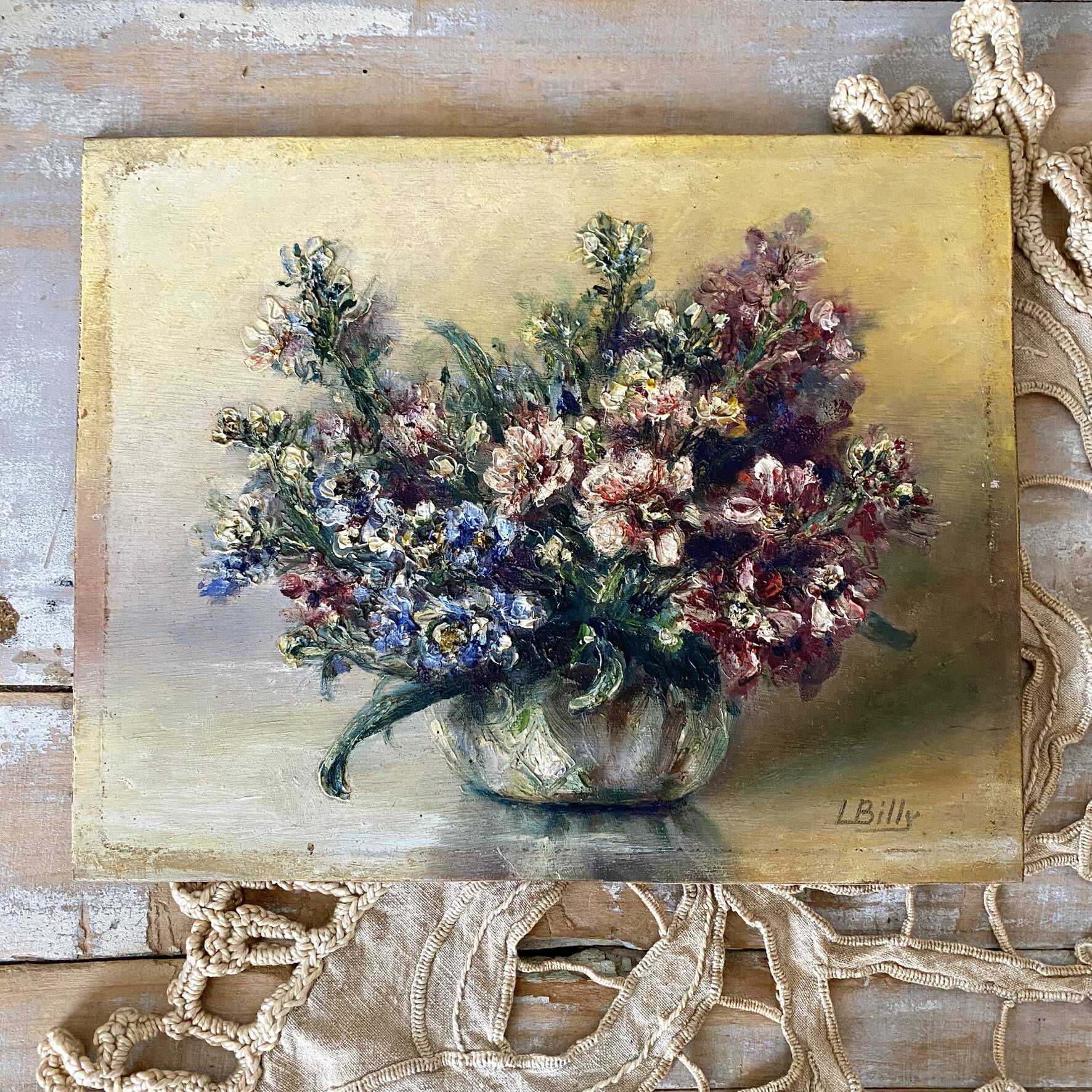 Old painting of a bouquet of flowers, oil on wood.