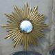 Gold metal sun mirror