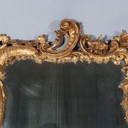 Mirror circa 1800, carved and gilded wooden frame, rocaille decoration, 54x39 cm, C227
