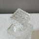 Transparent vintage decanter in chiseled glass and its hermetic cap 70's years