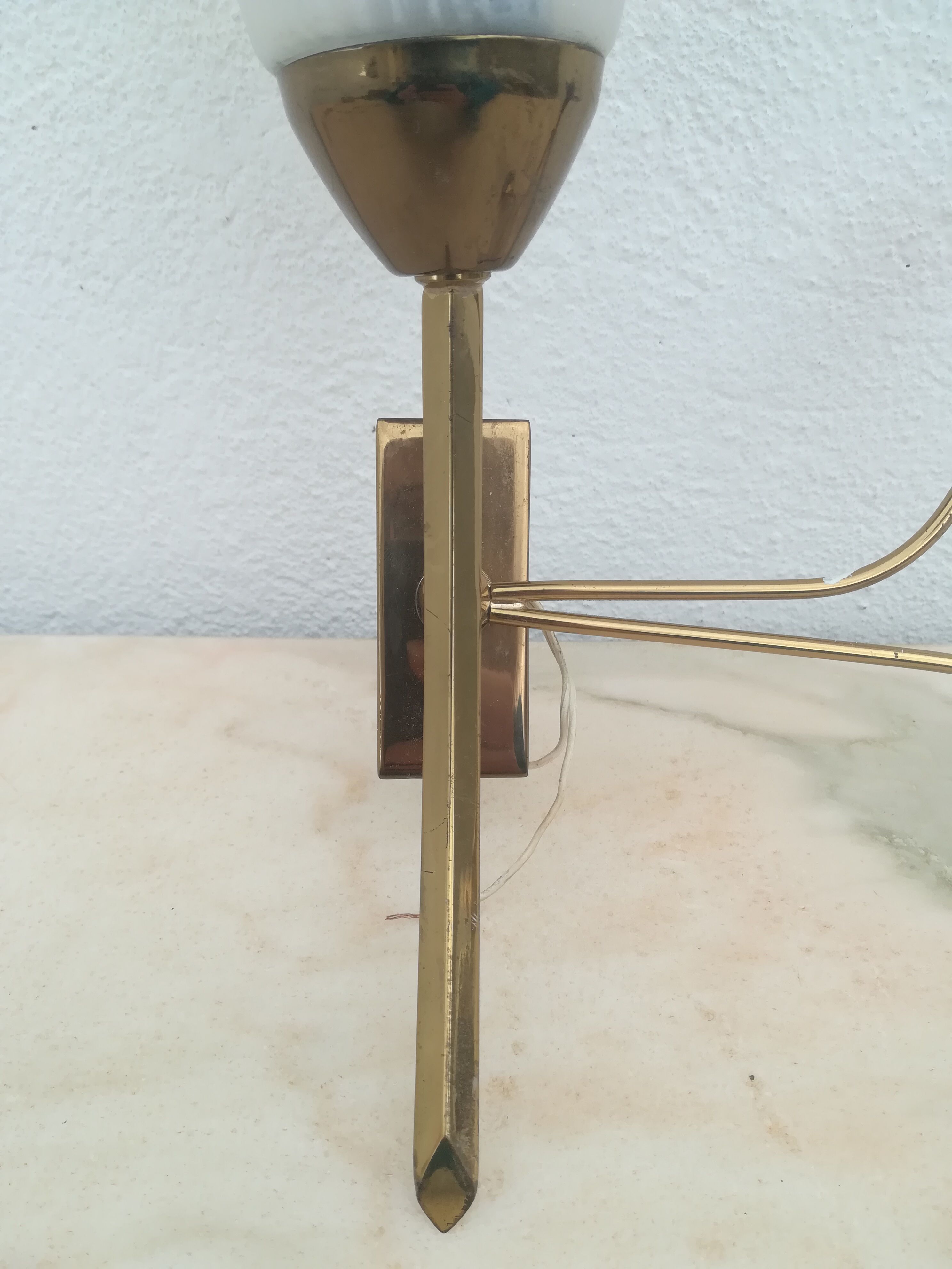 Wall light in brass
