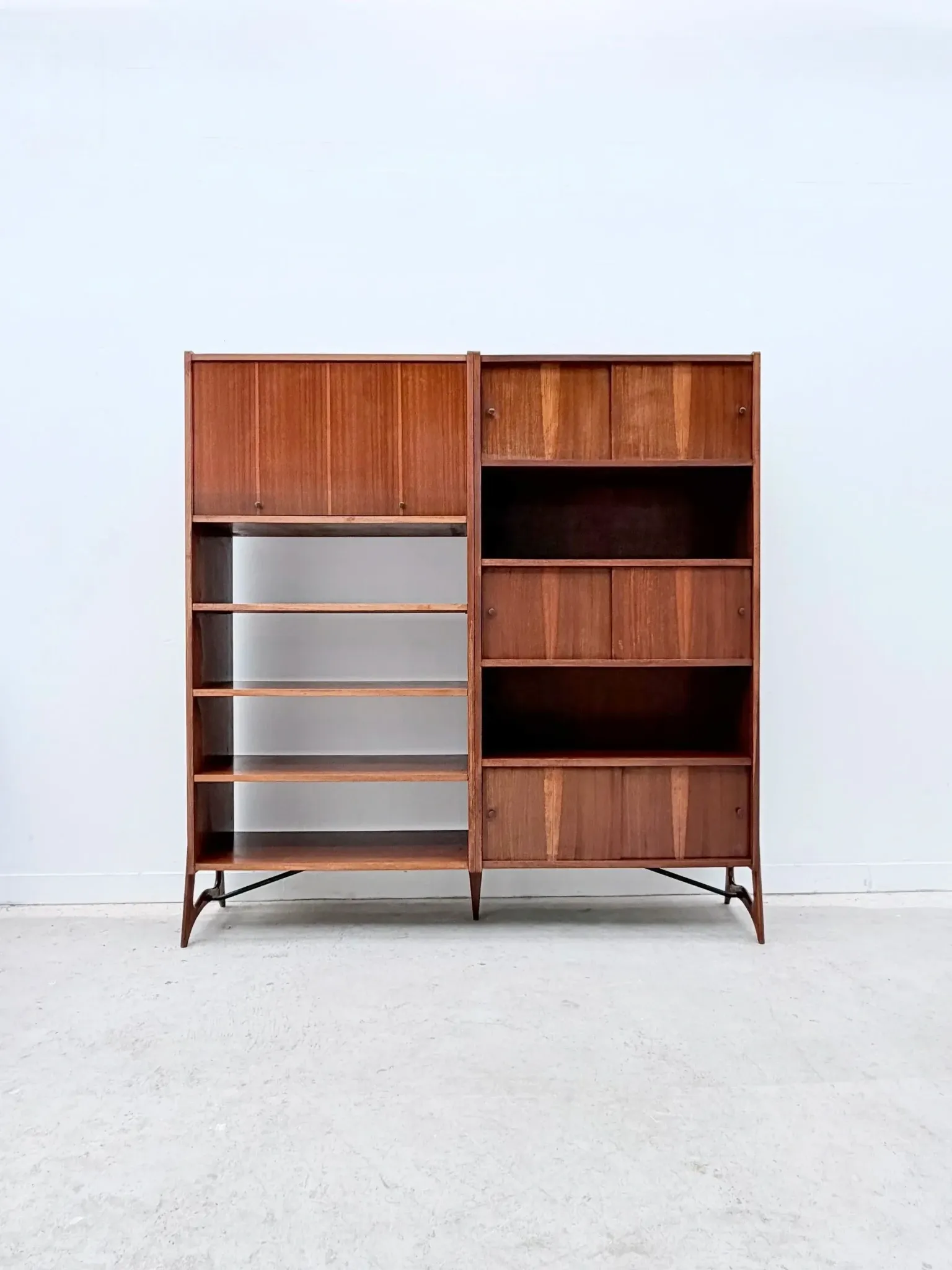 Scandinavian style bookshelf in teak and brass, 1950.
