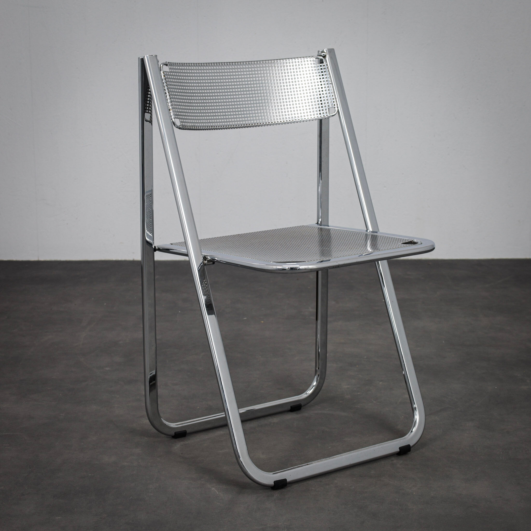 "Tamara" perforated metal folding chair by Arrben Italy (1980s)