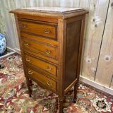 Louis XVI style molded and carved walnut chest of drawers