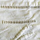 Old drapework and embroidered with 2 flowers and a butterfly