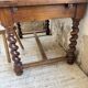 Paneled walnut desk with turned legs, 1900