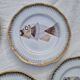 Set of 9 Saint Amand flat plates with fish decor