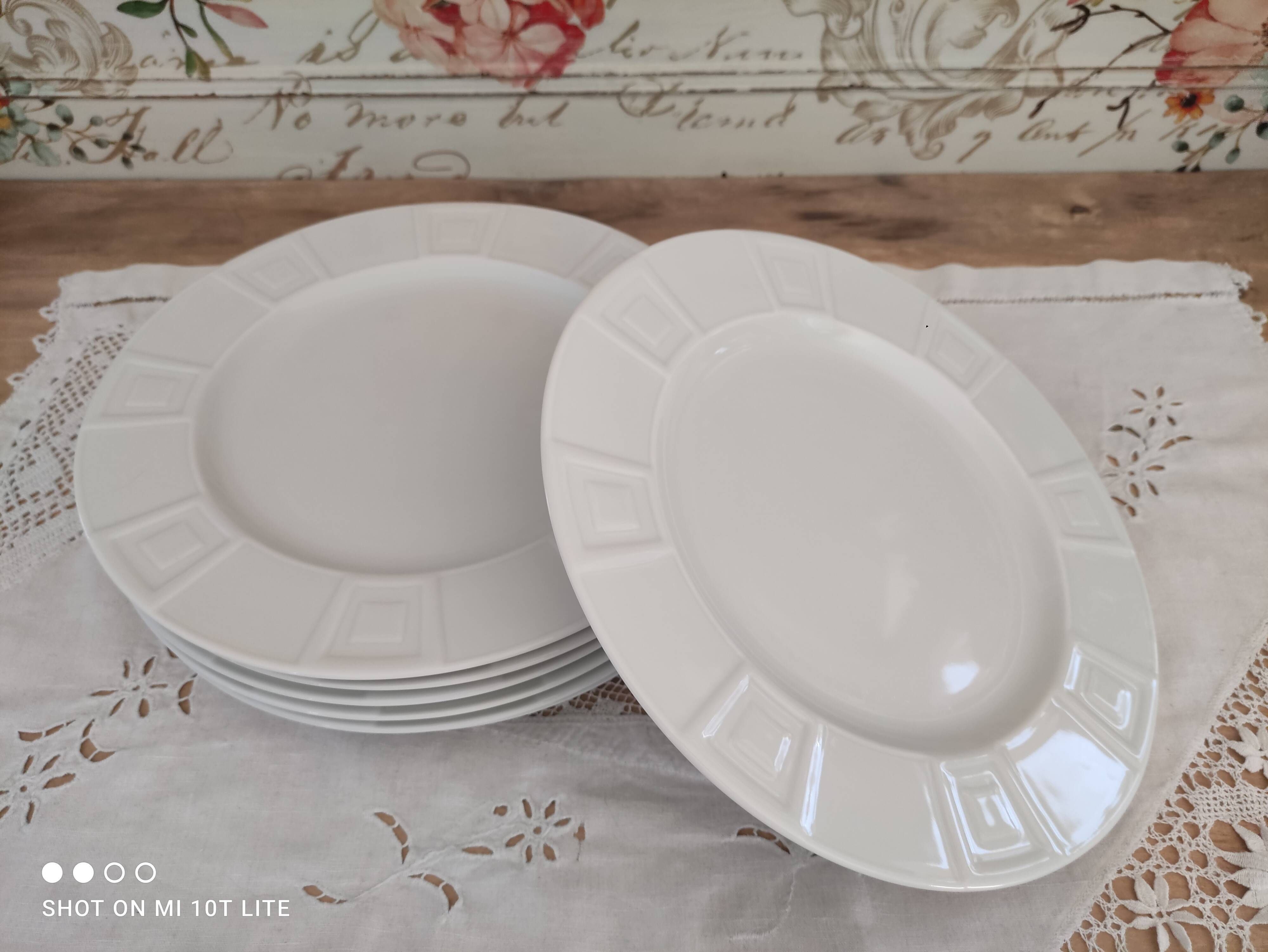 Set of 7 flat plates in white Limoges porcelain geometric decoration in relief