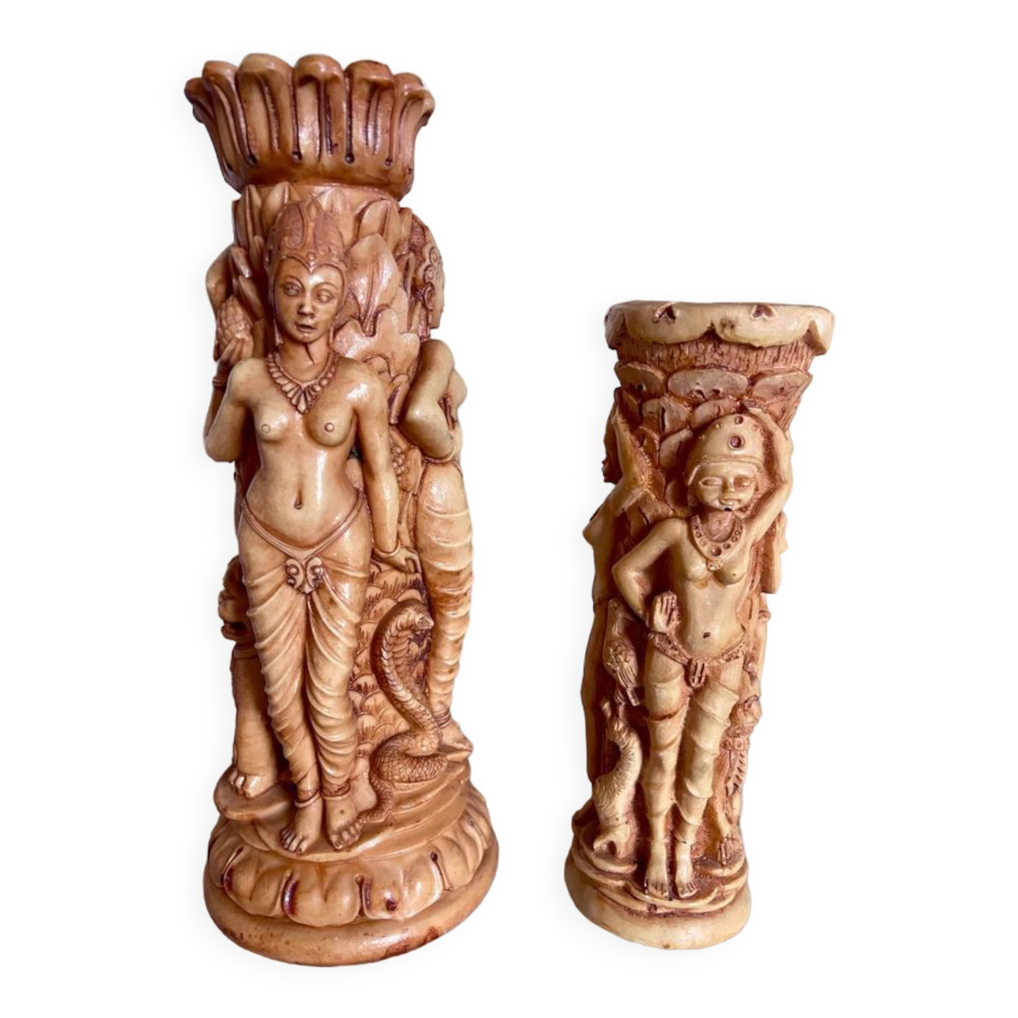 Two ancient Indonesian candlesticks.