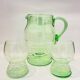 Art Deco carafe and its two glasses, in uraline
