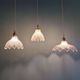 Trio of Art Deco scalloped clear glass pendant lights, 1920-30