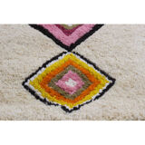 Berber carpet with knotted stitches in natural wool