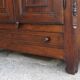 Antique solid wood wardrobe in historical rustic style from the 19th century.
