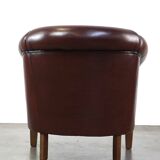 Nice sheepskin club chair with a beautiful patina