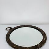 Round wrought iron porthole mirror