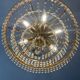 Brass hot air balloon chandelier with cascade of tassels
