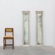 Pair of Neoclassical Silver Leaf Pier Mirrors with Ringed Columns and Corni