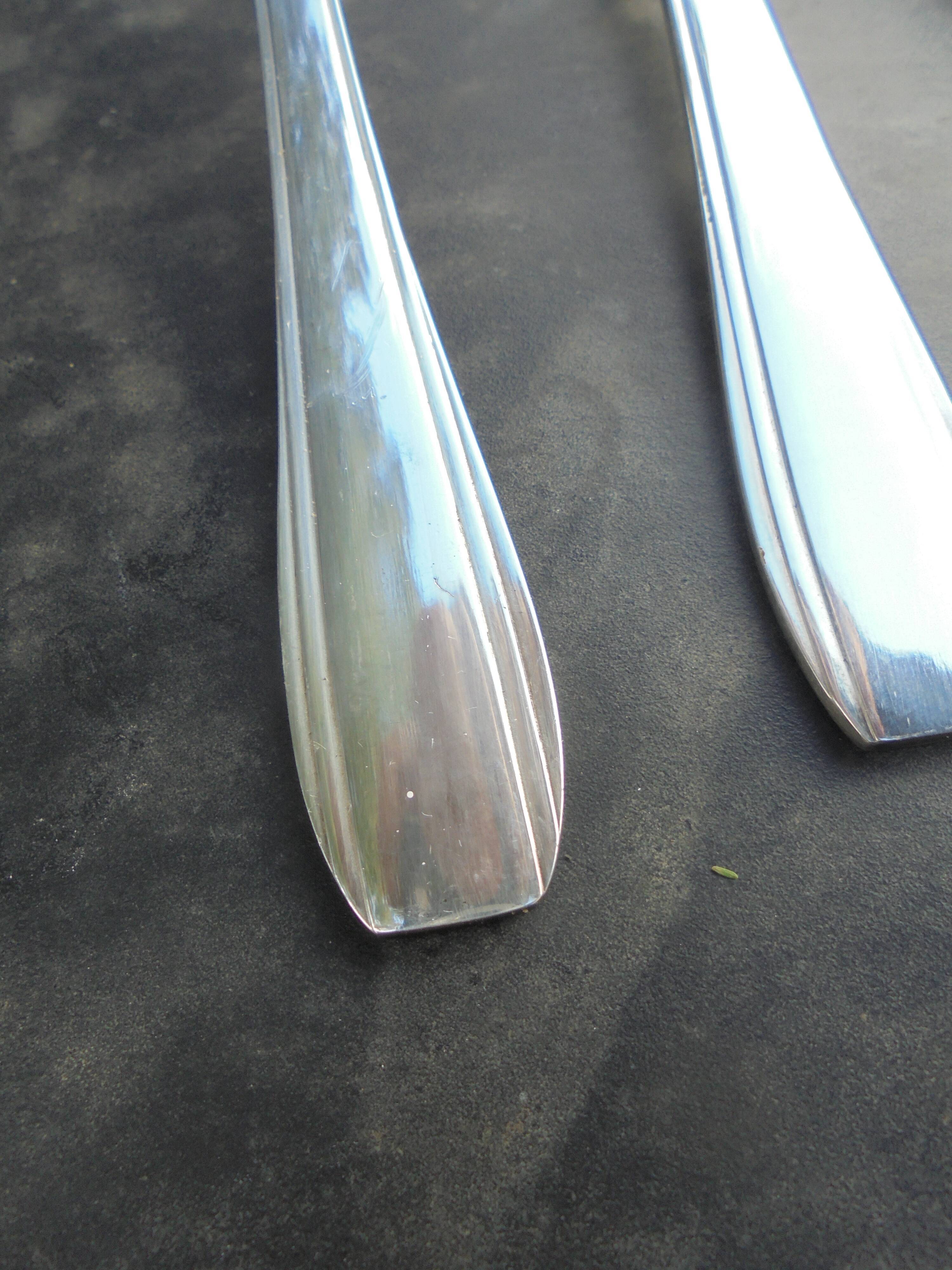 12 Art Deco silver metal forks